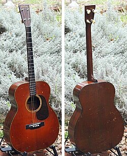 Músicos con guitarra tenor
