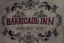 Emblema del Barricade Inn